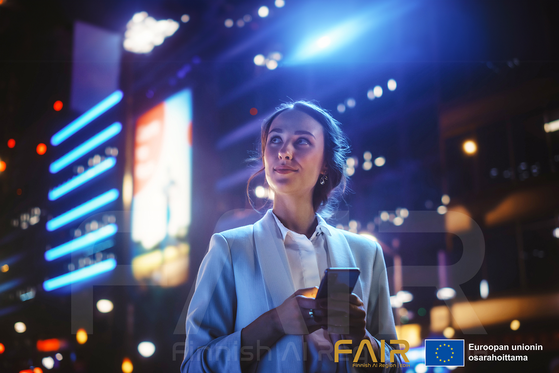 Beautiful Young Woman Using Smartphone Standing on the Night City with neon lights. On right bottom corner you can see golden FAIR logo and European union flag.