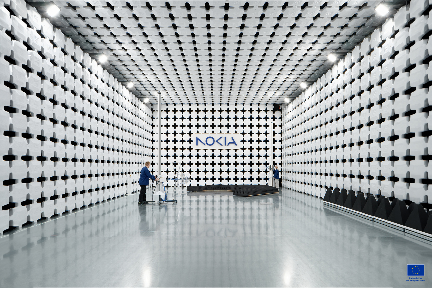 Person moving in Nokia Oulu Campus. Photo by Nokia.