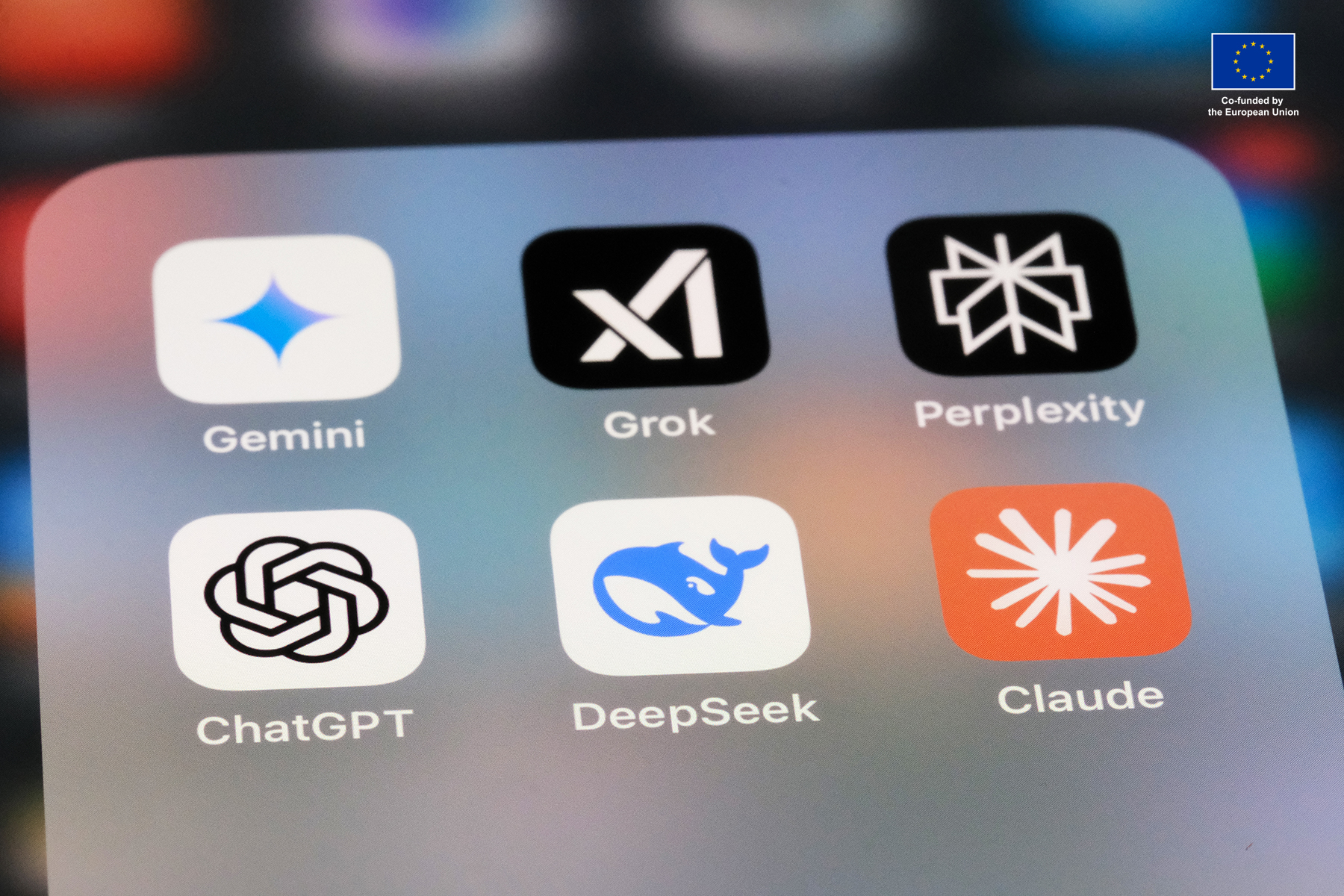 Picture of mobile phone screen with icons of different LLM models