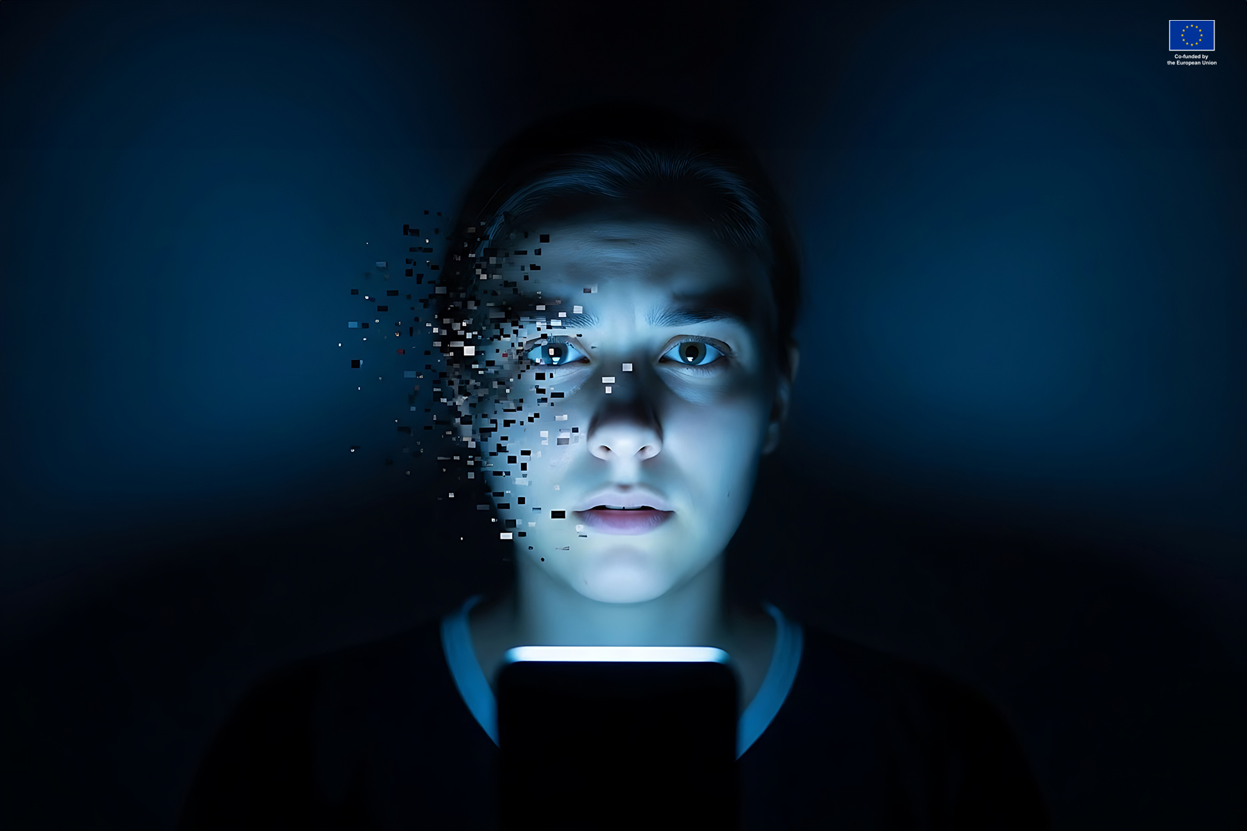 Young man front of a mobile phone and his face is pixelating.