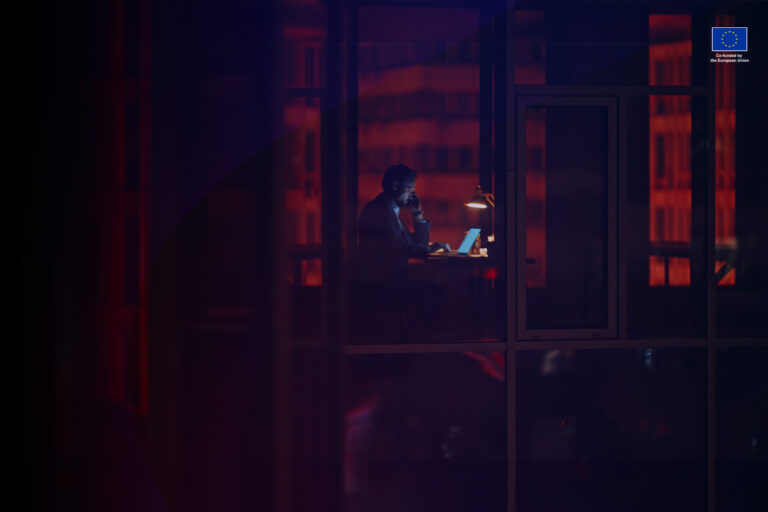 Person working at the office in the middle of night