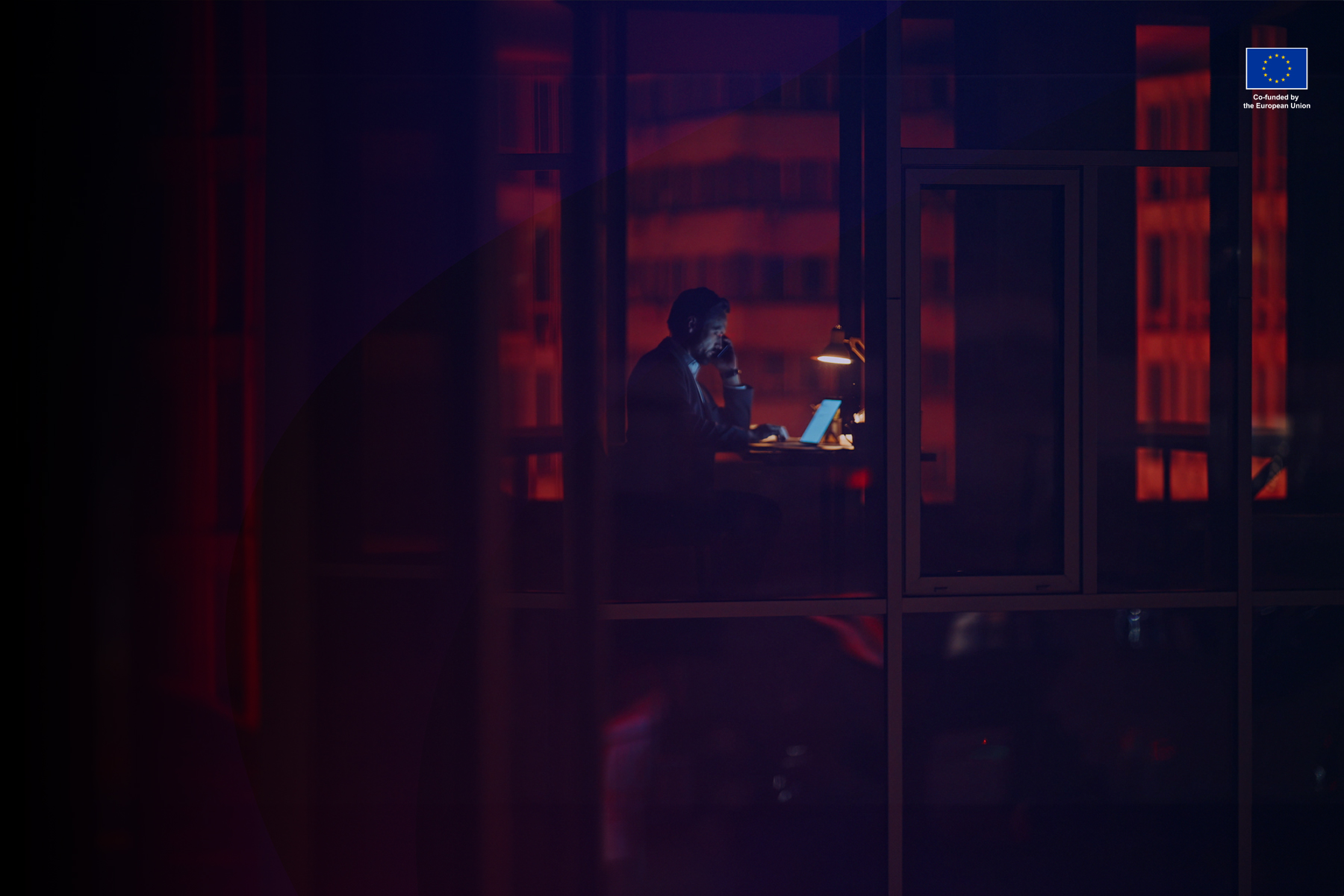 Person working at the office in the middle of night