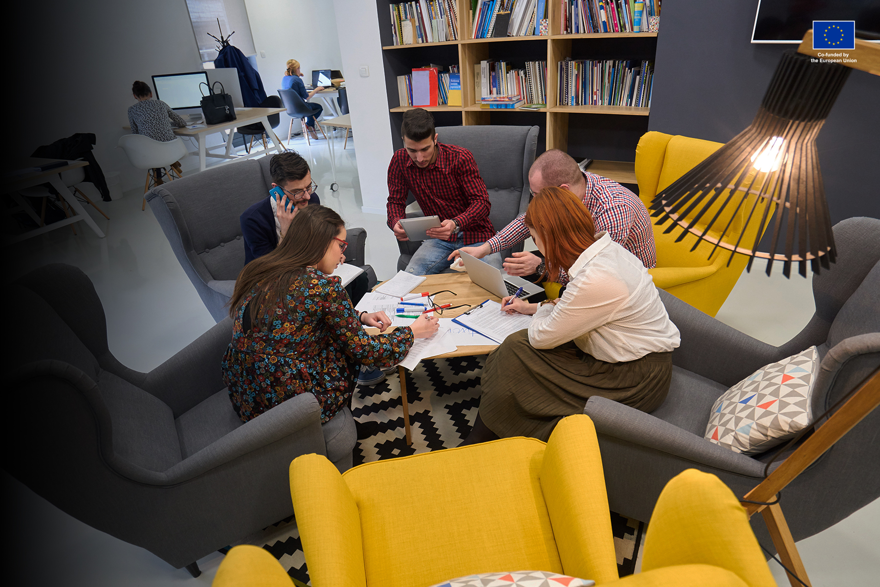 group of young business people , Startup entrepreneurs working on their venture in coworking space