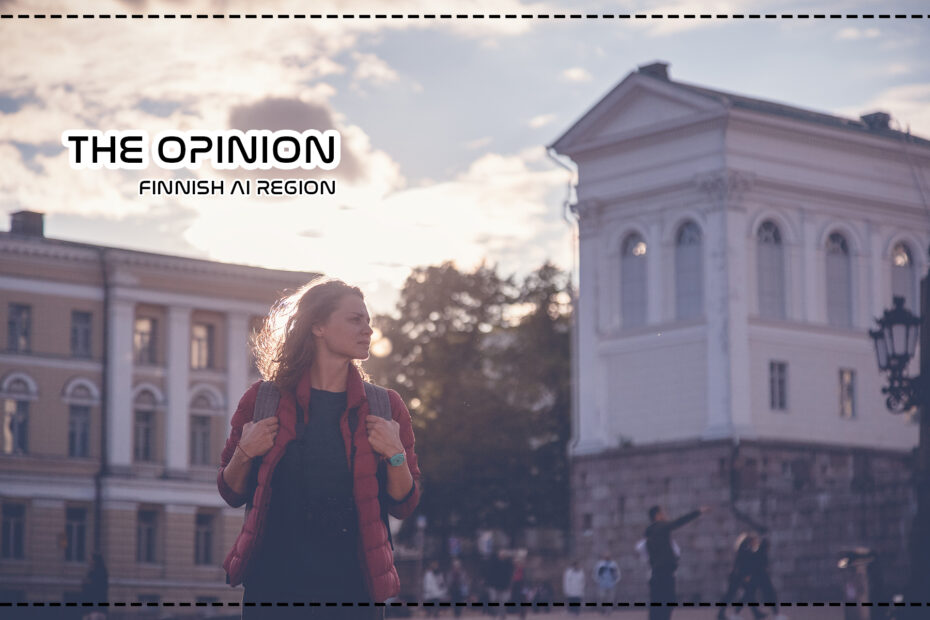 A beautiful young woman traveler with a camera on Senate Square in Helsinki, the capital of Finland, a popular destination for traveling to Northern Europe