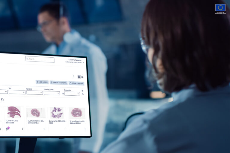 Woman detecting cancer from a computer. Photo by Aiforia.