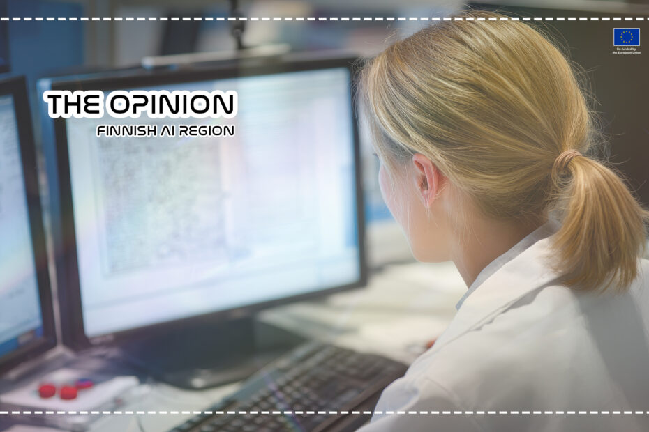 Over-the-shoulder view of a woman with blonde hair in a ponytail wearing a white lab coat, working at a workstation with multiple computer monitors showing medical or scientific data.